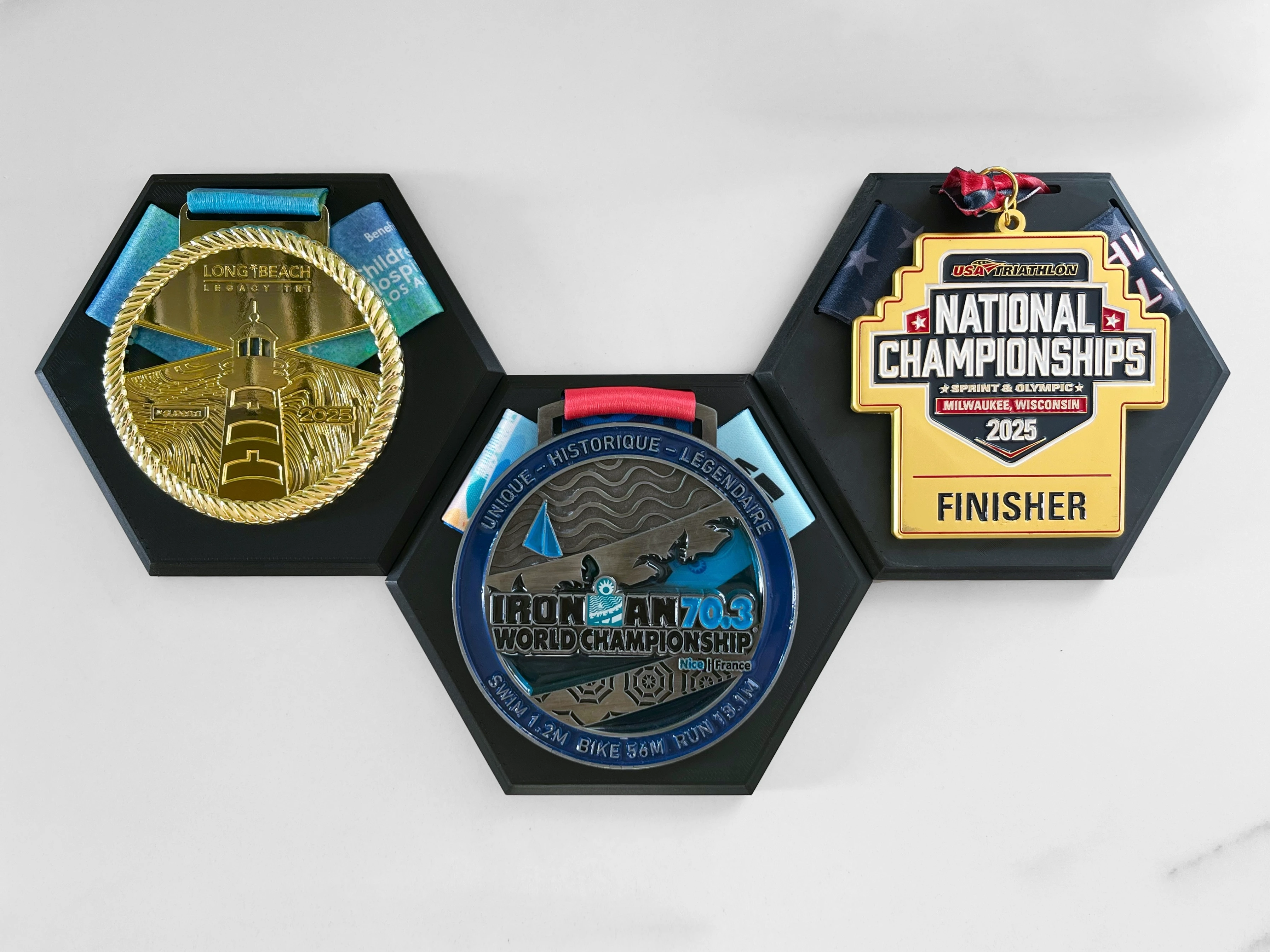 Hexagonal medal display with 5,000+ MakerWorld downloads